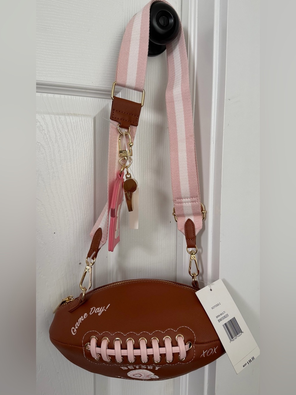 Brown Football-Shaped Crossbody Bag with Pink Striped Strap - Betsey Johnson